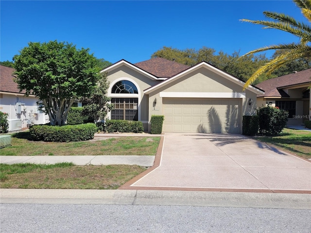 ranch-style home featuring a garage