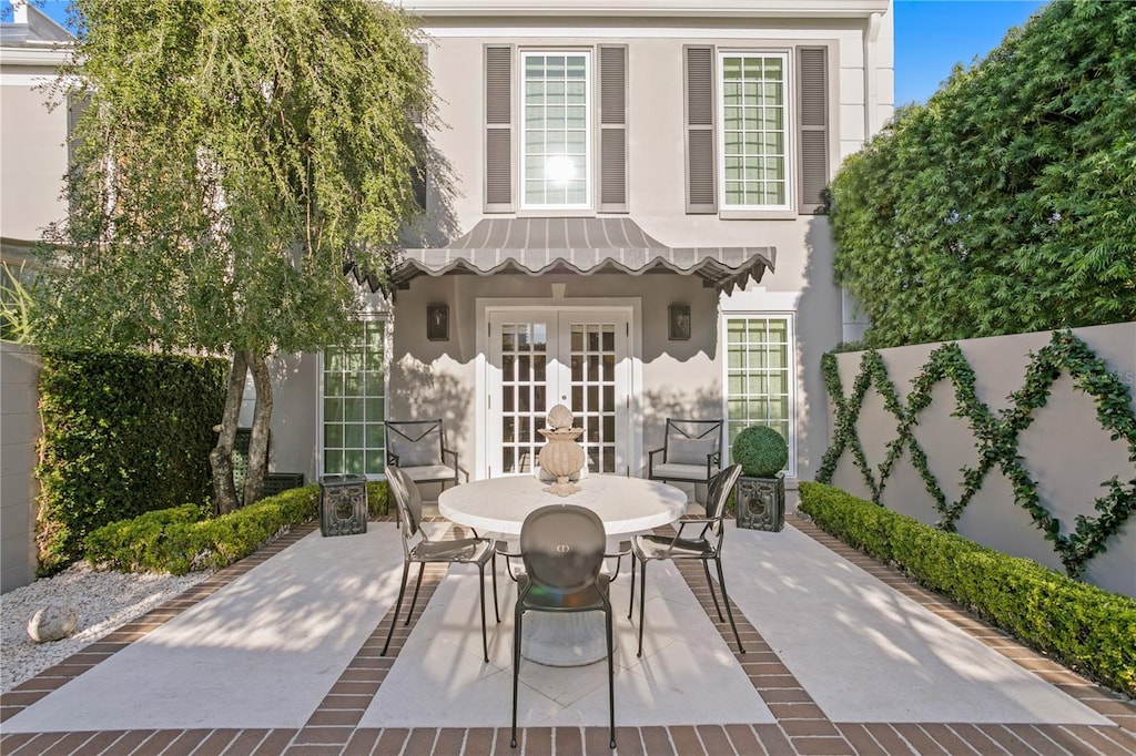 view of patio featuring french doors