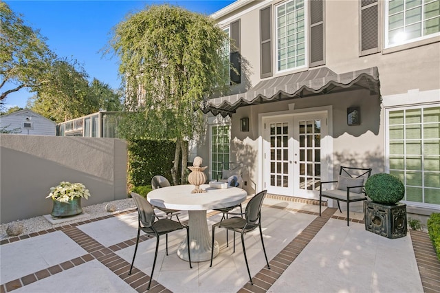 view of patio / terrace featuring french doors