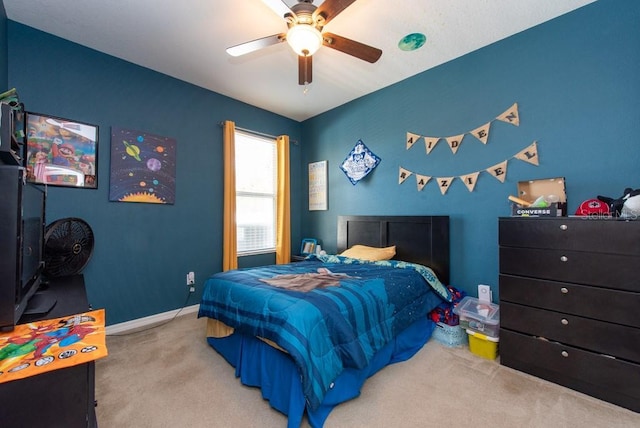 bedroom featuring ceiling fan and light colored carpet