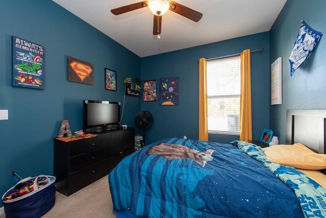 bedroom featuring ceiling fan and light colored carpet