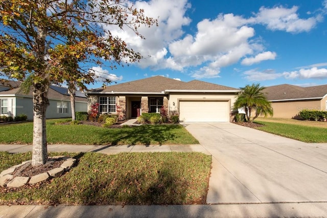 ranch-style home with a front lawn and a garage