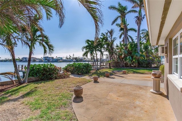 view of patio with a water view