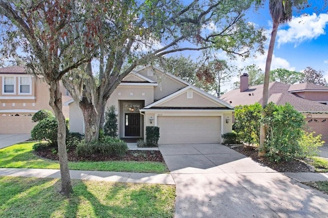 view of front of property with a garage