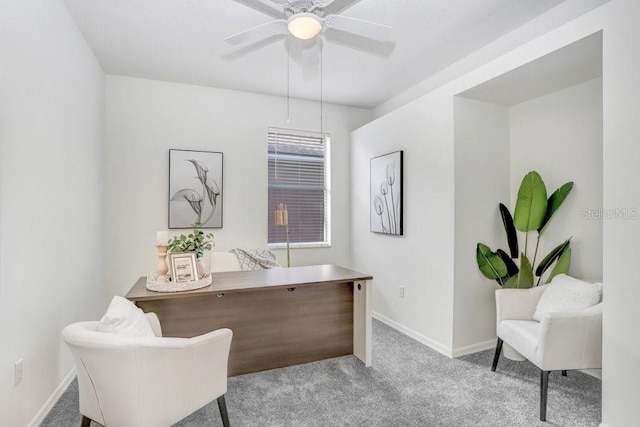 office with light colored carpet and ceiling fan