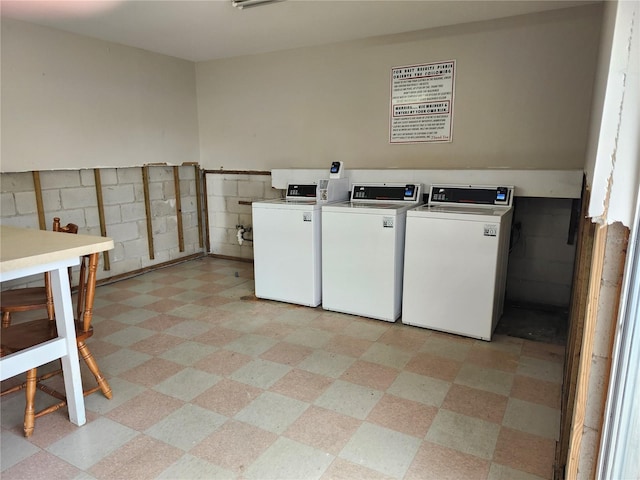 washroom with washing machine and dryer