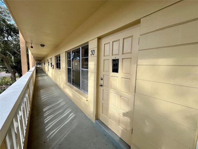 property entrance with a balcony