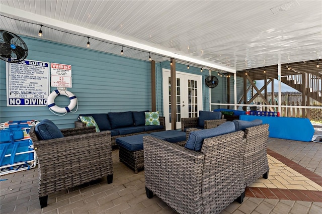 view of patio featuring french doors and outdoor lounge area