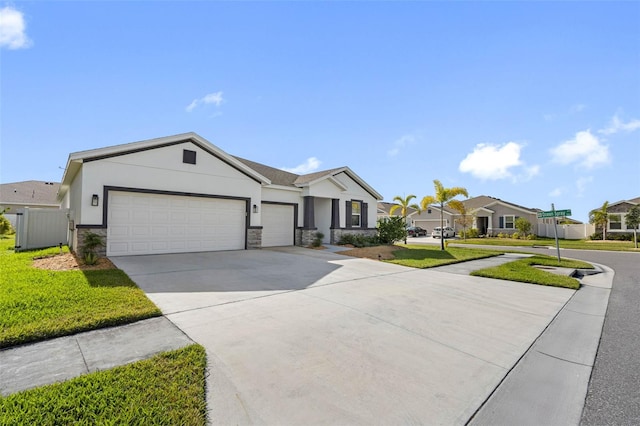 ranch-style house with a front lawn and a garage