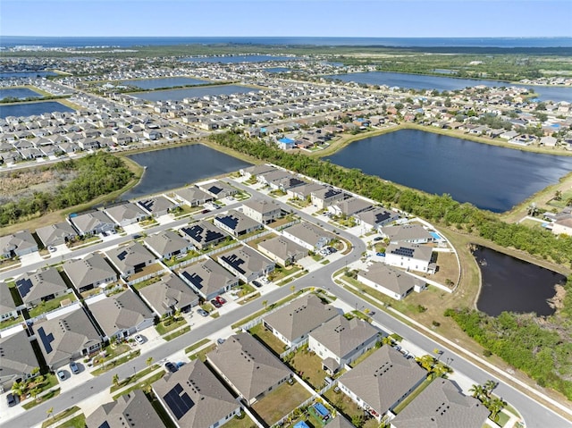 drone / aerial view with a water view