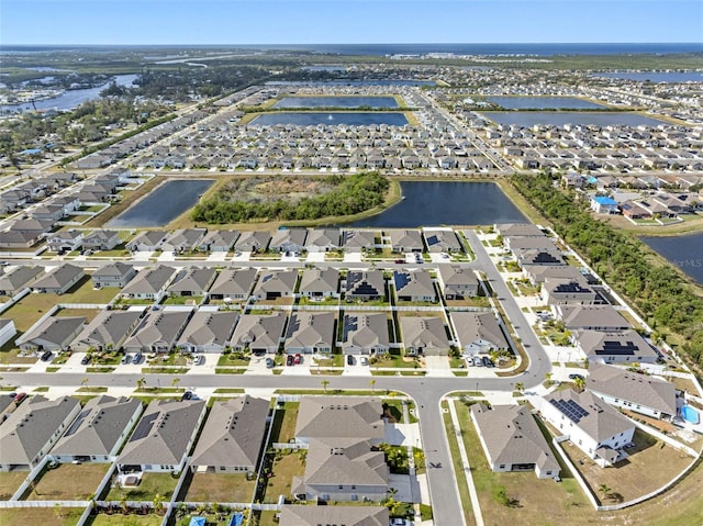 drone / aerial view featuring a water view