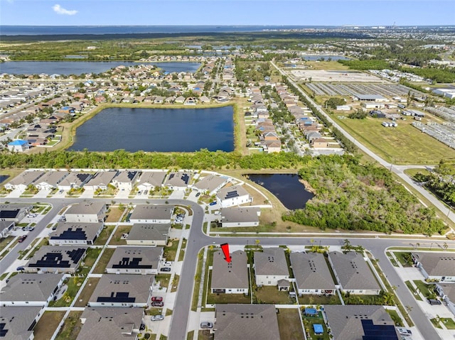 drone / aerial view featuring a water view