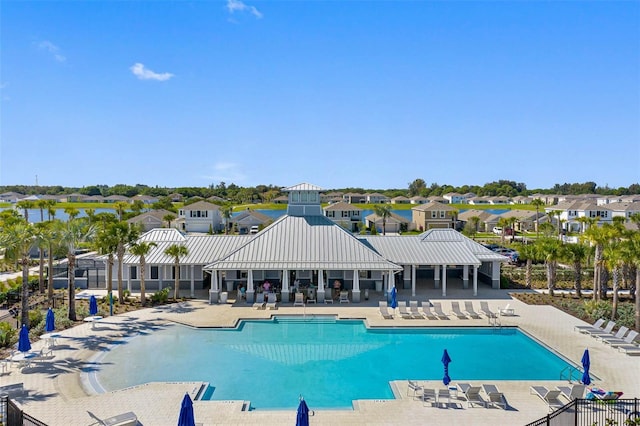 view of pool featuring a patio