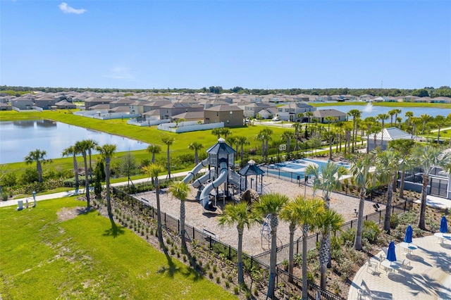 bird's eye view with a water view