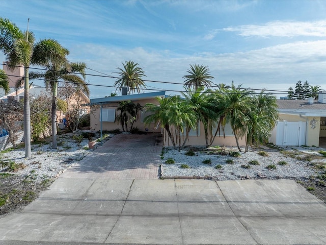 view of front facade with a carport