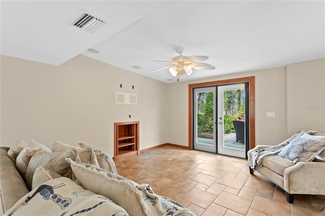 living room featuring ceiling fan