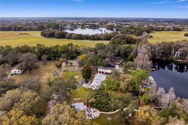 bird's eye view featuring a water view and a rural view