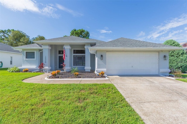 10328 Henderson St, Spring Hill, FL 34608 - view of front of home with a garage and a front lawn