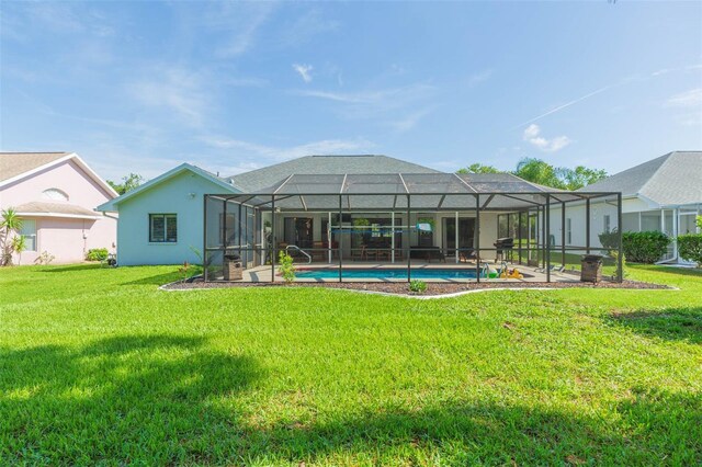 10328 Henderson St, Spring Hill, FL 34608 - back of property featuring a lawn and a lanai