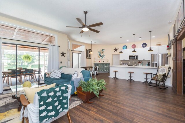 10328 Henderson St, Spring Hill, FL 34608 - living room with ceiling fan and dark hardwood / wood-style floors