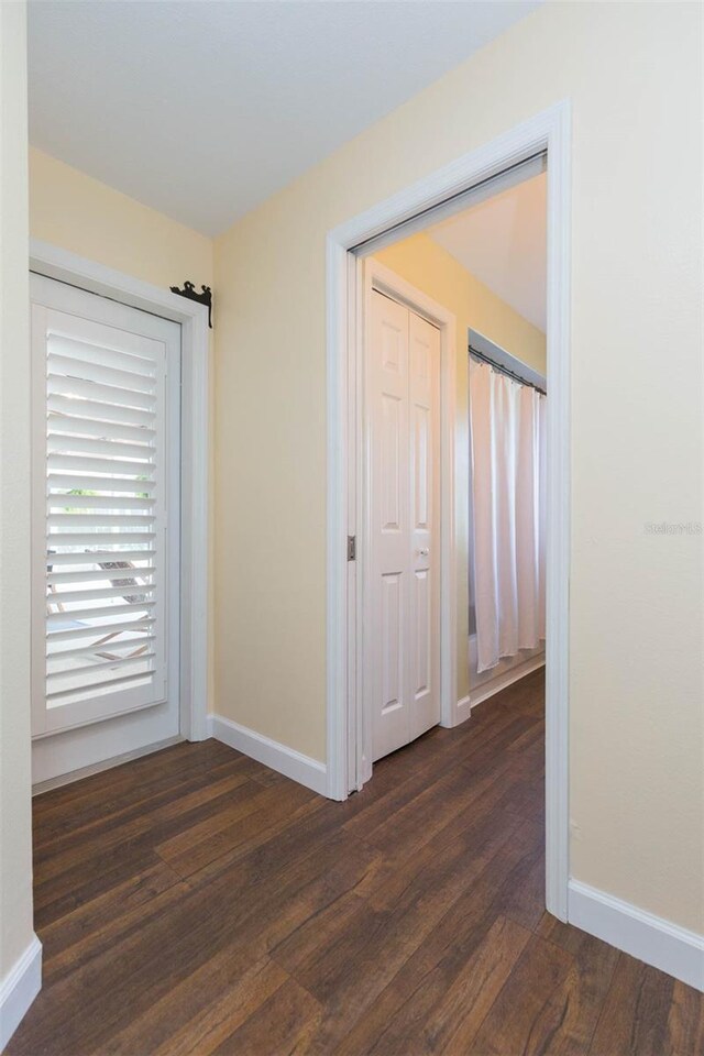 10328 Henderson St, Spring Hill, FL 34608 - hall featuring dark hardwood / wood-style flooring