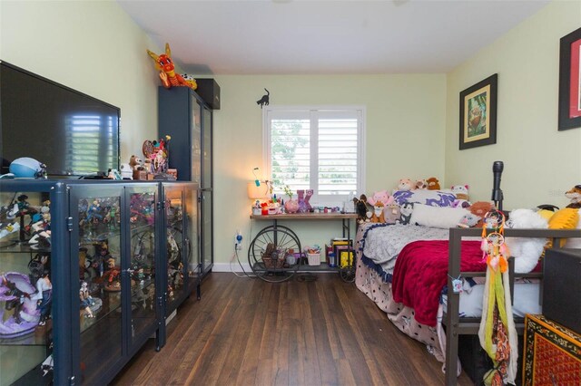 10328 Henderson St, Spring Hill, FL 34608 - bedroom featuring dark hardwood / wood-style floors
