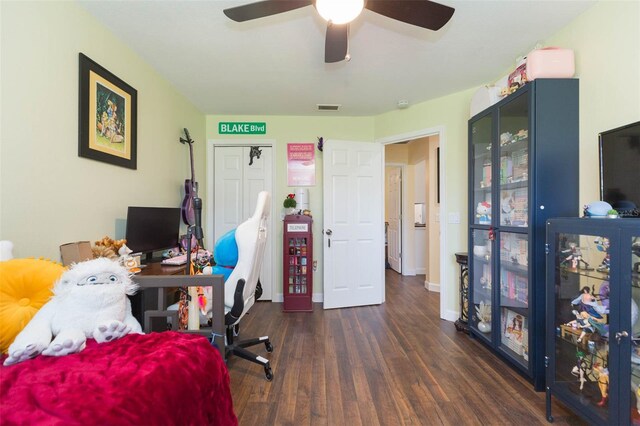 10328 Henderson St, Spring Hill, FL 34608 - office area with ceiling fan and dark wood-type flooring