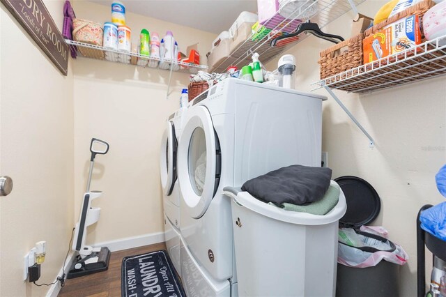 10328 Henderson St, Spring Hill, FL 34608 - laundry room with hardwood / wood-style flooring and separate washer and dryer