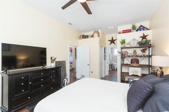 10328 Henderson St, Spring Hill, FL 34608 - bedroom with hardwood / wood-style floors, connected bathroom, and ceiling fan