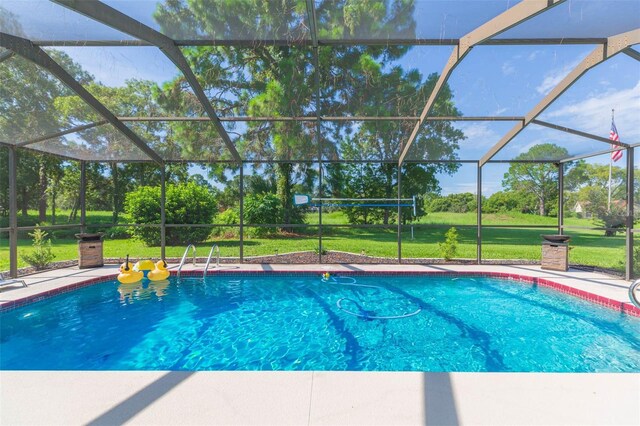 10328 Henderson St, Spring Hill, FL 34608 - view of pool with a lawn and glass enclosure