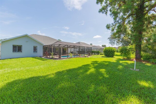 10328 Henderson St, Spring Hill, FL 34608 - view of yard with a lanai