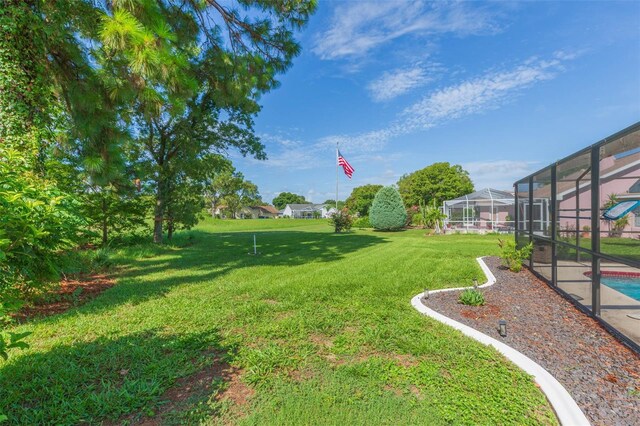 10328 Henderson St, Spring Hill, FL 34608 - view of yard featuring a lanai
