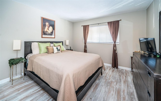 bedroom featuring light hardwood / wood-style floors