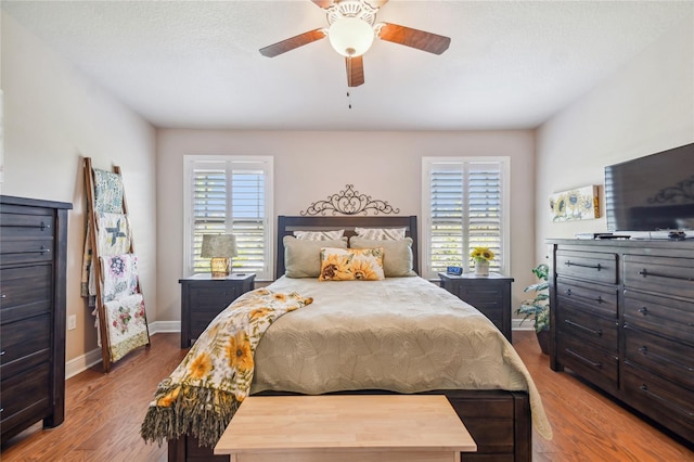 bedroom featuring ceiling fan and wood-type flooring