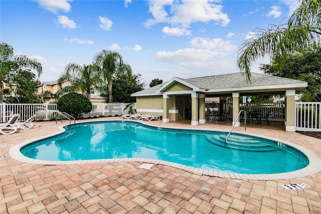 view of swimming pool featuring a patio