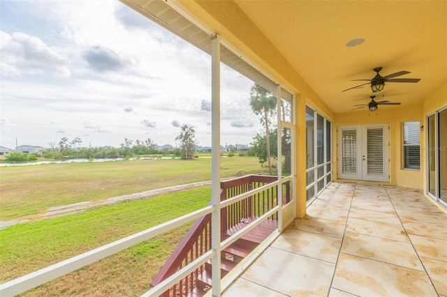 view of patio / terrace featuring french doors and ceiling fan