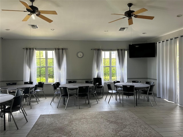 dining room featuring a wealth of natural light and ceiling fan