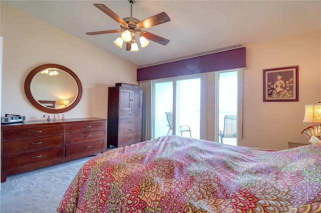 bedroom with ceiling fan, light colored carpet, and lofted ceiling