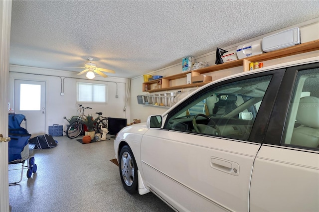 garage featuring ceiling fan