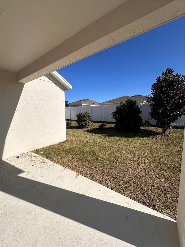 view of yard featuring fence