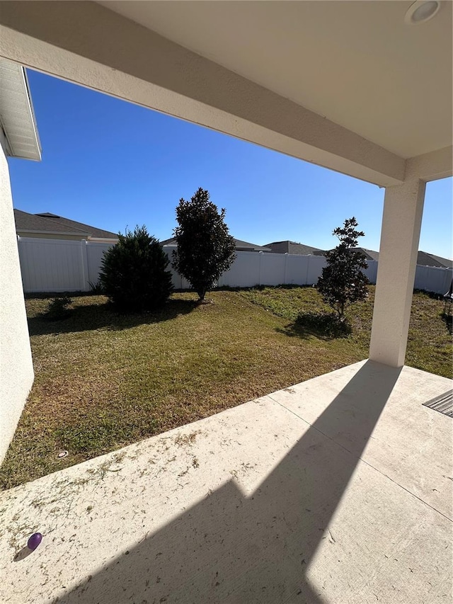 view of yard featuring a fenced backyard and a patio