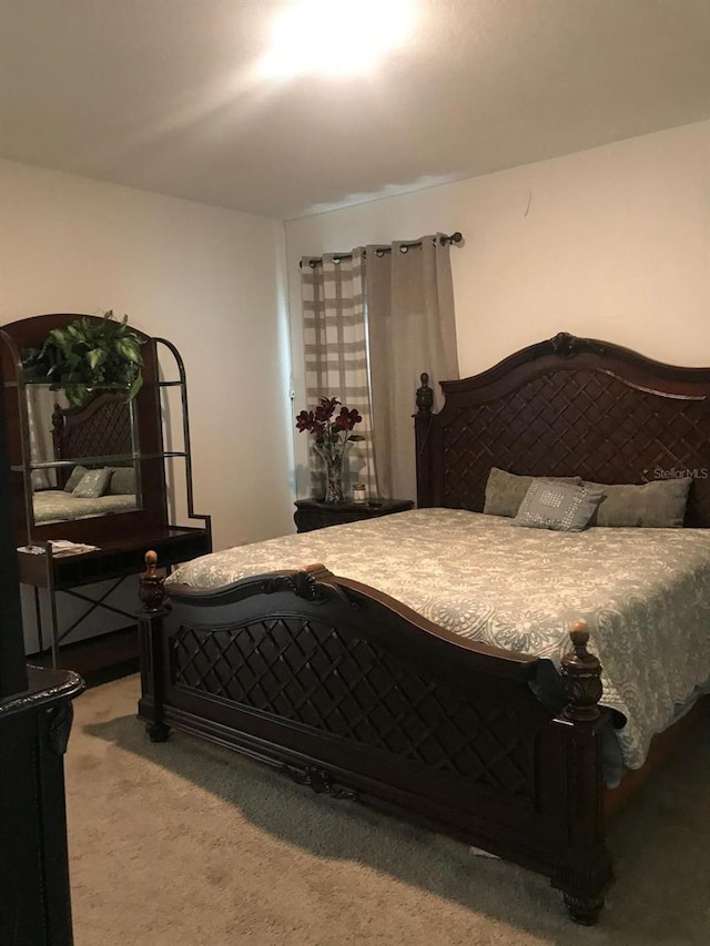 bedroom featuring carpet flooring