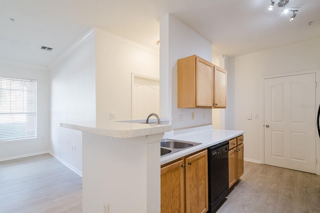 kitchen featuring visible vents, light wood-style floors, light countertops, ornamental molding, and dishwasher