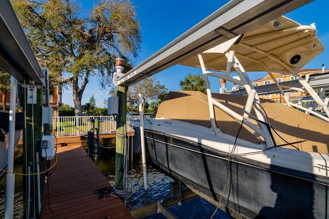 view of dock with boat lift