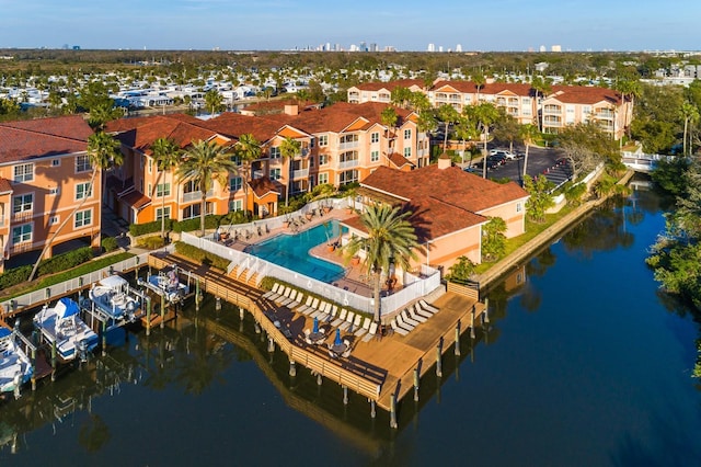 birds eye view of property featuring a water view