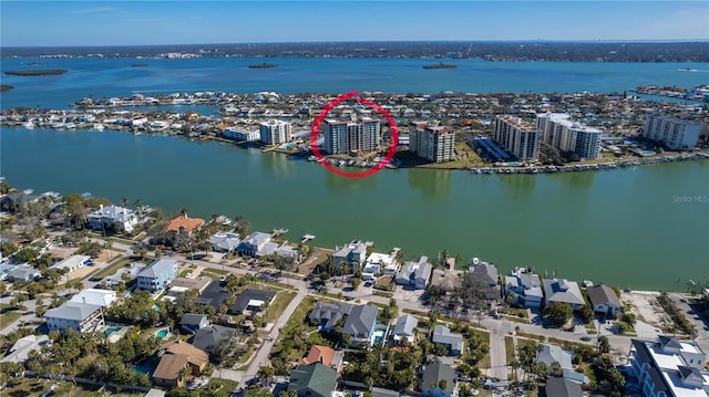 birds eye view of property with a water view