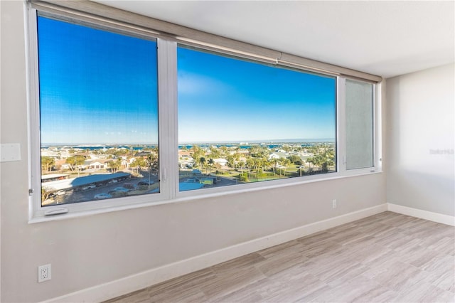 736 Island Way Unit 606, Clearwater Beach, FL 33767 - empty room featuring wood finished floors and baseboards