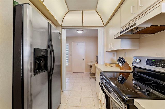 kitchen featuring light tile patterned floors and appliances with stainless steel finishes