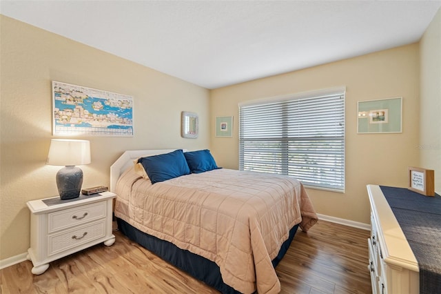 bedroom featuring light hardwood / wood-style floors