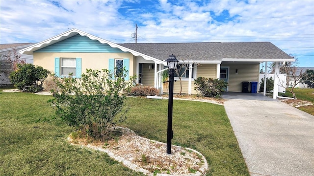 ranch-style house featuring a front yard and a carport